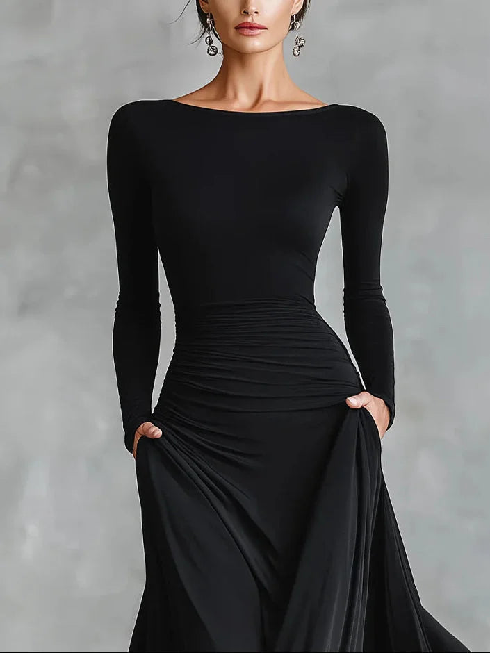 Modern long black crepe dress with pleated boat neckline